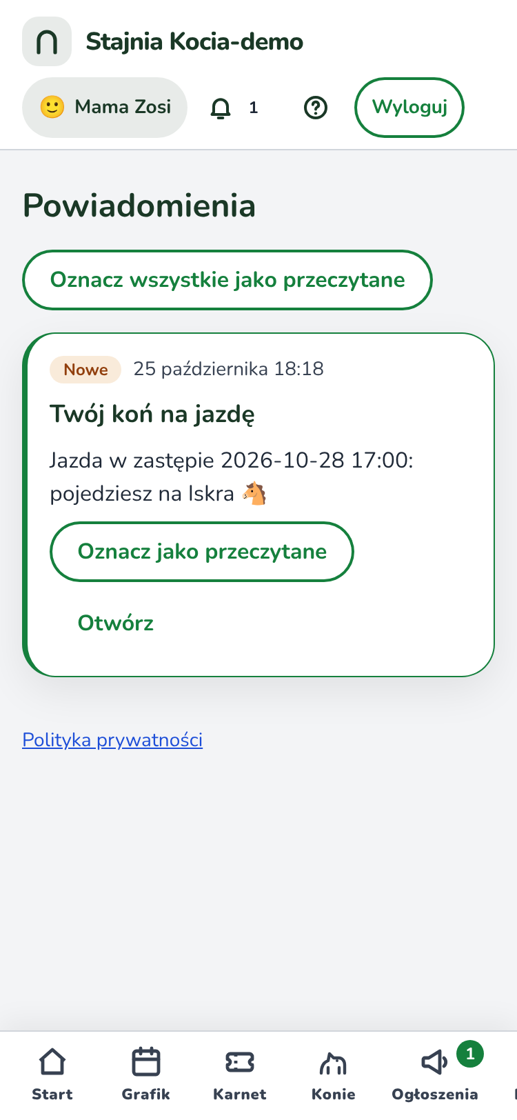 Ekran „Powiadomienia” w telefonie: lista wiadomości ze stajni, przy nowej napis „Nowe” i przyciski „Oznacz jako przeczytane” oraz „Otwórz”.